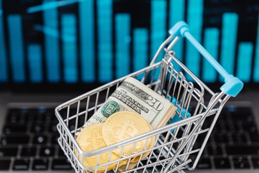 Symbolic image of cryptocurrency and cash in a shopping cart on a laptop, representing digital finance and trading.